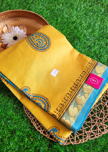 Yellow And Copper Sulphate Blue Printed Silk Cotton Saree- TN