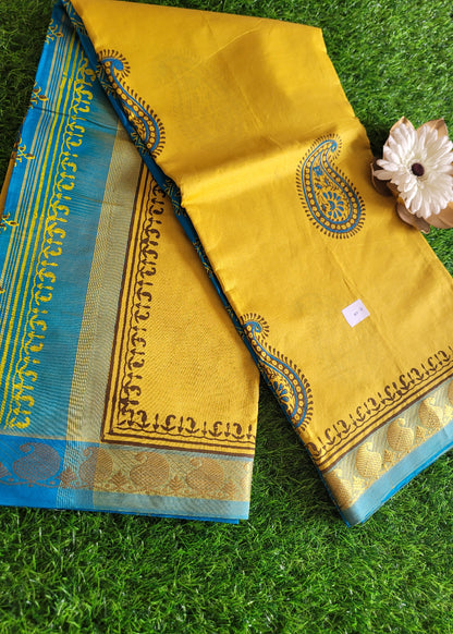 Yellow And Copper Sulphate Blue Printed Silk Cotton Saree- TN