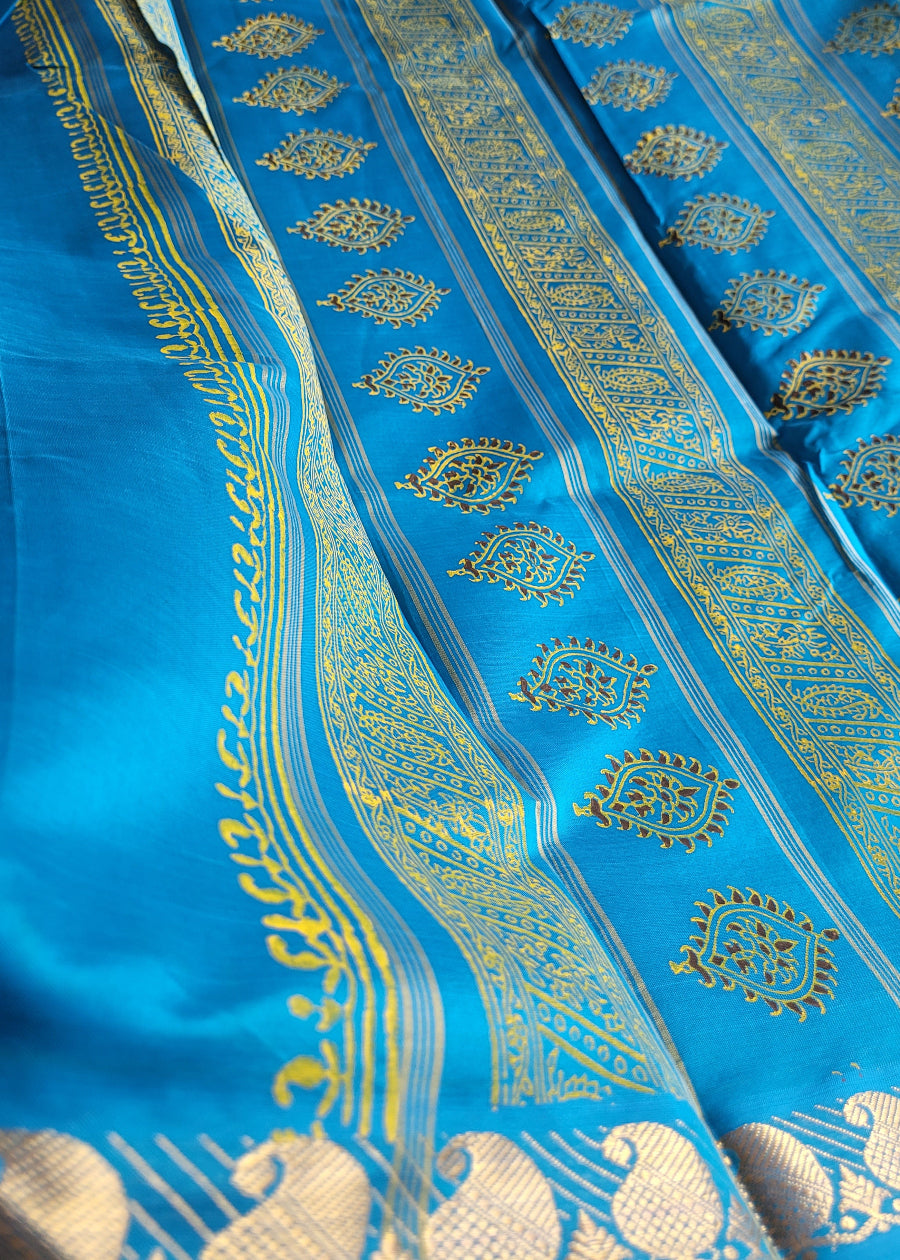 Yellow And Copper Sulphate Blue Printed Silk Cotton Saree- TN