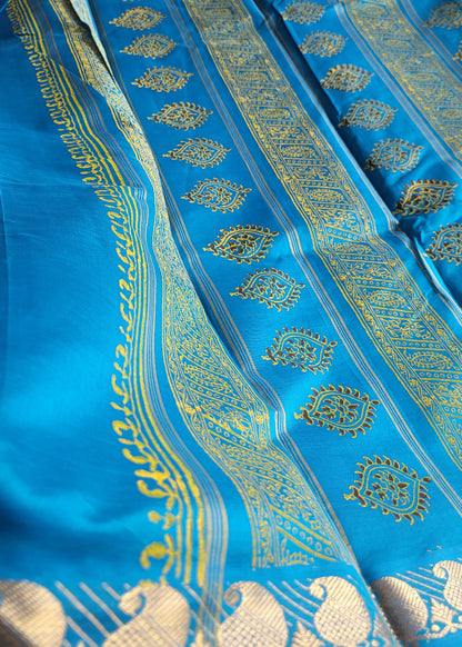 Yellow And Copper Sulphate Blue Printed Silk Cotton Saree- TN