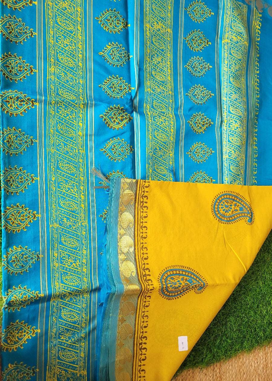 Yellow And Copper Sulphate Blue Printed Silk Cotton Saree- TN