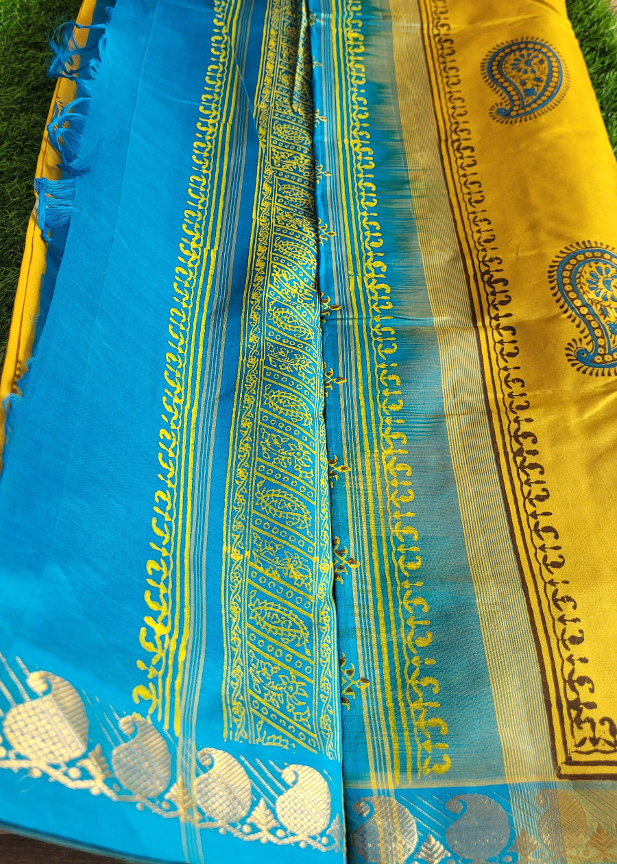 Yellow And Copper Sulphate Blue Printed Silk Cotton Saree- TN
